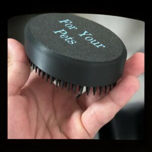 Palm-Sized Pet Grooming Made Easy Introducing our innovative 3D-printed palm-held pet brush! This compact and portable tool is perfect for on-the-go grooming sessions or quick touch-ups between baths. Its ergonomic design fits comfortably in your hand, making it easy to reach those hard-to-reach places. Features: Portable and Compact: Easily fits in your pocket or purse for convenient grooming on the go. Ergonomic Design: Comfortable grip for easy use. Gentle on Your Pet's Coat: Soft bristles that remove loose hair without irritating your pet's skin. Durable Construction: Made from high-quality materials for long-lasting use. Give your furry friend a quick and easy grooming session with our palm-held pet brush.